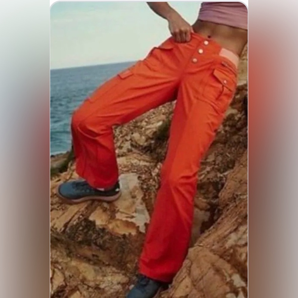 Free People Cascade Flare orange hiking pants. Size M.